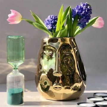 Gusta vaas met gezicht sfeerbeeld